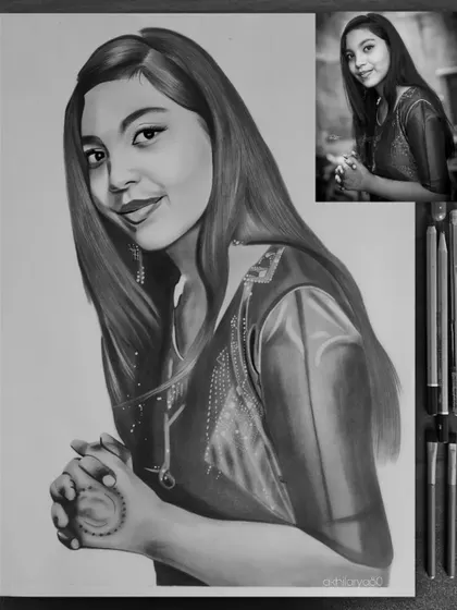 A beautiful black and white portrait on A4 paper. I paid special attention to the henna on her hand and the delicate details of her dress.
