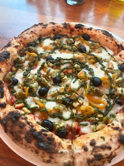Our Pesto Chicken pizza, a colourful and flavourful creation.
