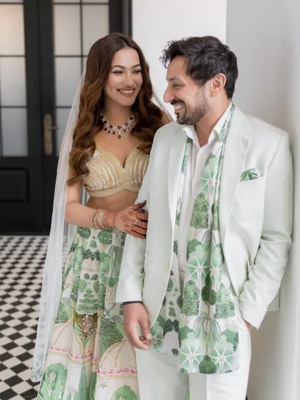 A portrait filled with love and laughter, as the newly engaged couple shares a happy, candid moment.