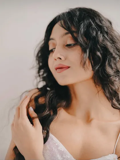 A gentle, downward glance from a photoshoot. It's fun to play with different poses and expressions.