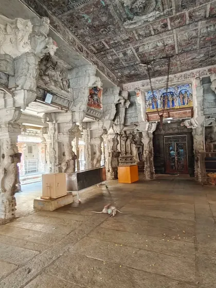 The interior of the Virupaksha temple, where a single panel of ancient ceiling painting survives, offering a glimpse into its former glory.
