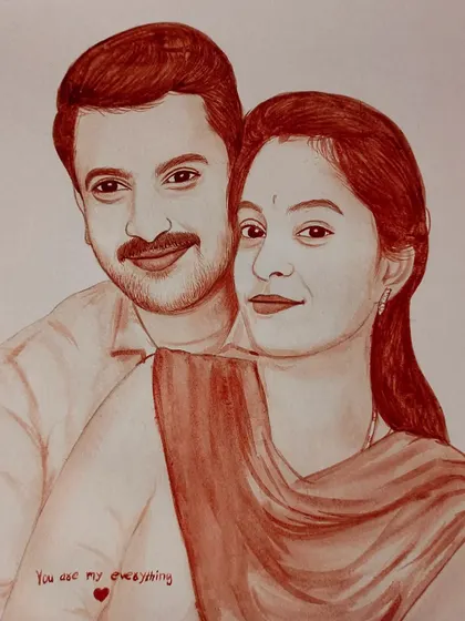 A romantic blood portrait of a couple with a handwritten message, "You are my everything." Adding a personal note makes the gift even more meaningful.