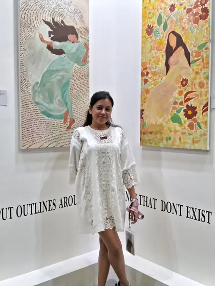 Artist Sinal Bajaj stands proudly with her collection at World Art Dubai. Her work, which highlights feminine independence, was a visual treat for art lovers.