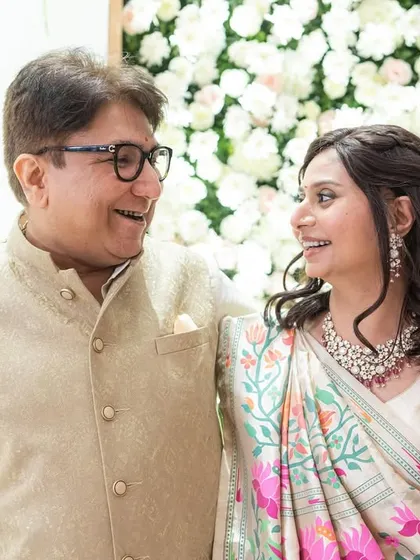 A sweet, happy moment between the mother of the bride and her husband. She has such a positive and strong energy, and it was a joy to do her makeup.