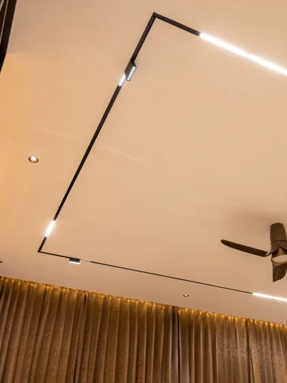 Magnetic track lighting offers incredible flexibility. Lights can be moved and repositioned easily, and their brightness and tone are controlled through our app.