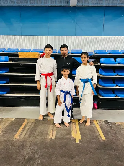 Another photo with my students after the South India tournament. The bond between a coach and students is forged through shared challenges and victories.