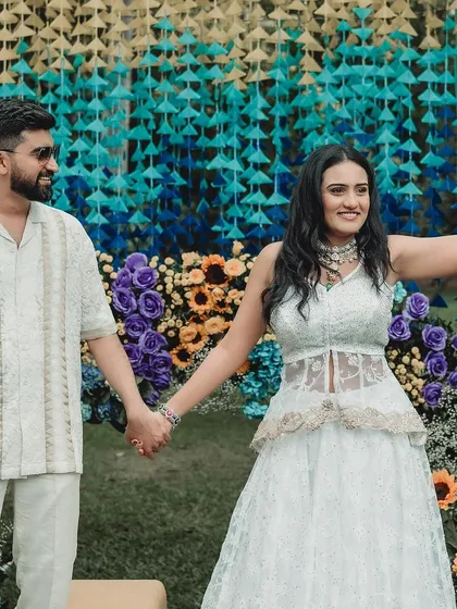 We designed this Haldi and Mehendi with multiple unique color palettes. The decor featured everything from stunning yellow and blue floral arrangements to lively orange accents for a truly dynamic celebration.