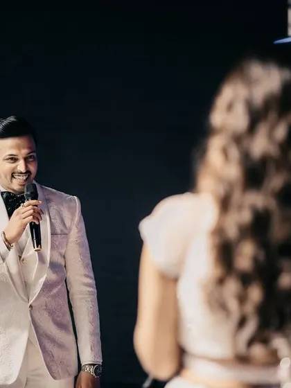 The groom delivers a heartfelt speech or song to his bride during the Sangeet night.