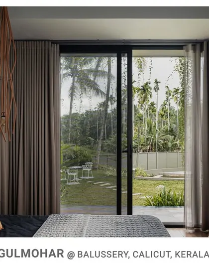 The view from the bed in the Gulmohar master suite looks directly out into the garden, emphasizing my philosophy of creating homes that are deeply connected to nature.