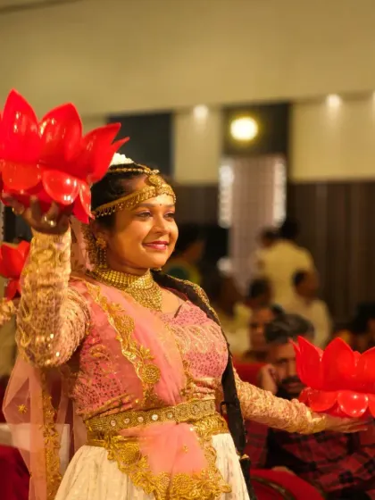 A graceful moment from a traditional welcome dance. Our performers are trained to engage with the guests and create a warm, inviting atmosphere as they arrive.