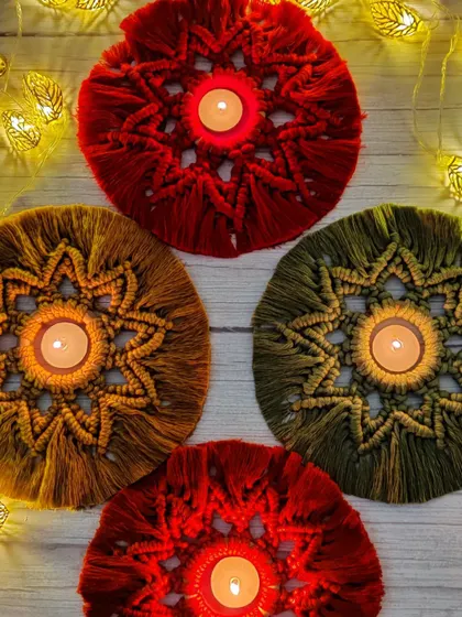 The rich, festive colors of these star-patterned tea light holders are perfect for the holiday season.