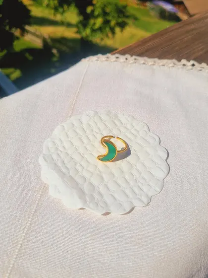 A beautiful outdoor shot of the Green Onyx Luna Ring. I craft these to help encourage new ideas and bring a sense of balance.