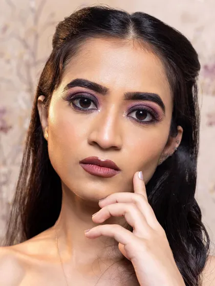 A bold purple smokey eye. This look is about mastering color theory and blending techniques to create a dramatic, high-fashion look that is perfect for a portfolio.