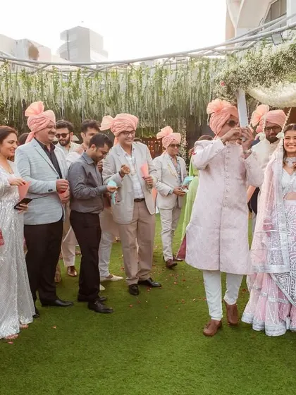 The bride's procession, full of dancing and happy family members, as they walk her down the aisle.