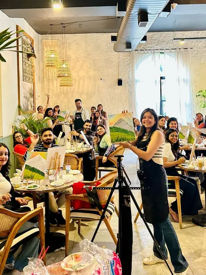 A full house at one of our cafe workshops! It's so rewarding to look out at a room full of people painting, chatting, and having a wonderful time.