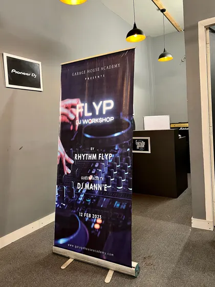The standee banner from our FLYP DJ Workshop, which provides all the key details for attendees upon arrival at the venue.