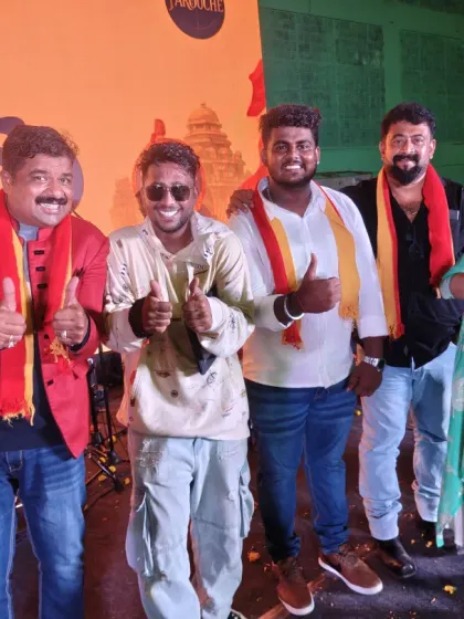 Thumbs up with the whole crew after a successful show. Teamwork makes every event a success.