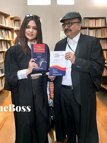 Holding a copy of a new legal book at the Supreme Court library. Continuous learning and sharing knowledge is fundamental to being an effective advocate.