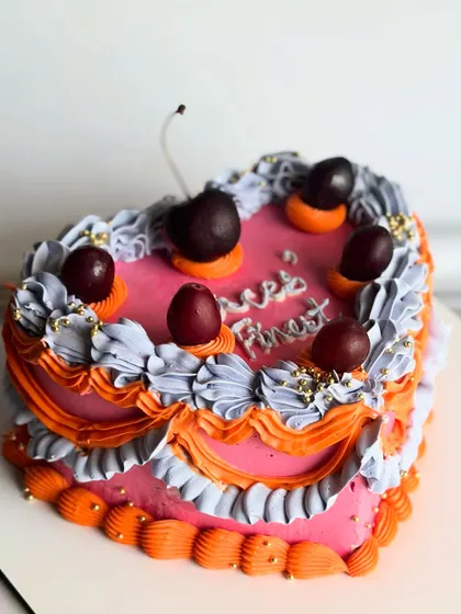 Soft, sweet, and full of Pisces charm. This heart-shaped minimal cake with fresh cherries is a dreamy treat for the Pisces in your life.