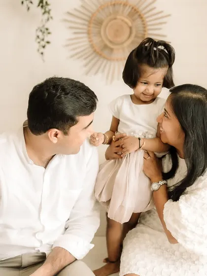 A candid moment of interaction between parents and their little girl. I love capturing these unscripted looks of love.