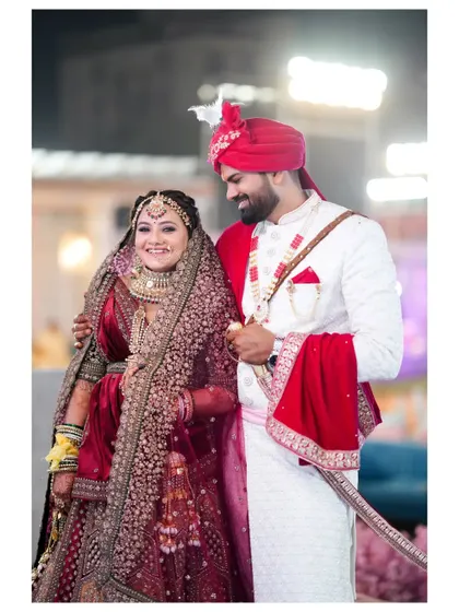 A joyful, candid shot of the couple sharing a laugh. This image perfectly captures the happiness and comfort they share with each other.