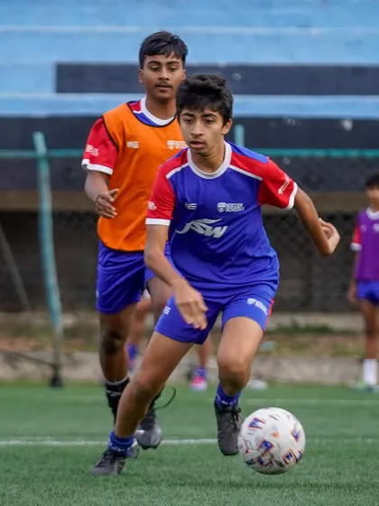 A young player dribbles forward with speed and control. We focus on developing attacking skills that allow players to be direct and effective.