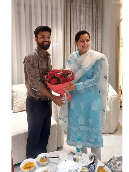 A moment of appreciation as we present a bouquet to Honorable State Minister Aditi Tatkare during her visit to our client's home.