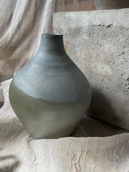 A few of my favorite finished vases from a recent collection, featuring a variety of glazes, painted details, and forms. Each one has its own personality.