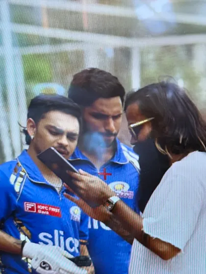Behind the scenes of the Garnier Men shoot, reviewing a take with cricketers Ishan Kishan and Tilak Varma. Collaboration is key to getting the perfect shot.