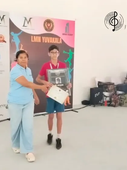 Kabir receives his award after a phenomenal drum performance at a world-record event. We are so proud of his hard work and dedication.
