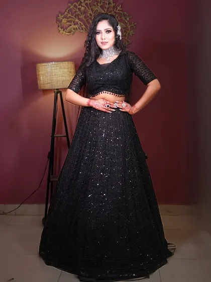A full-length view of the black sequin lehenga, a timeless and elegant choice.