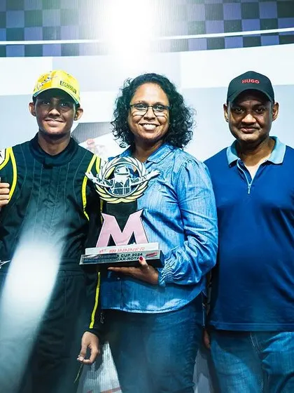A driver and his family celebrating a vice-championship win.