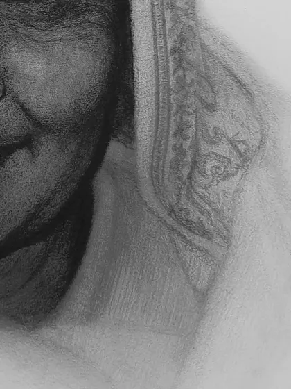 A close-up showing the soft shading around her face, creating a gentle and loving feel.