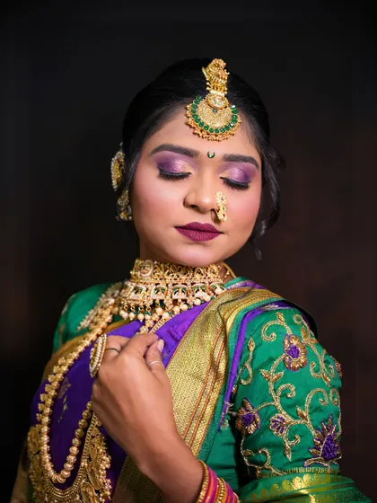 A stunning Maharashtrian bridal look with bold purple eyeshadow, created by one of my talented students. This demonstrates their ability to play with color while maintaining a traditional aesthetic.