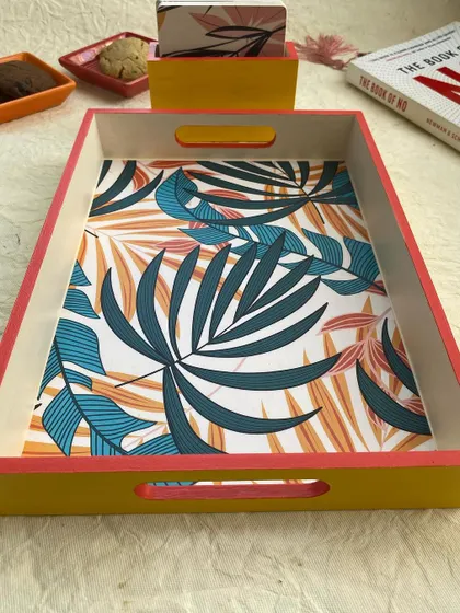 A close-up of the hand-painted tray, highlighting the clean finish and the vibrant decoupage print.