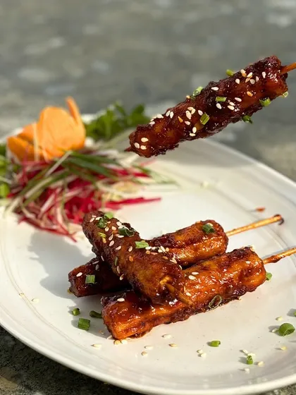A tempting shot of our chicken skewers, perfect for starting your meal.