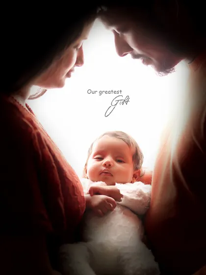 The moment your family grows by two tiny feet. We capture this profound connection as you hold your greatest gift, creating a timeless portrait that is all about the love that now fills your arms.