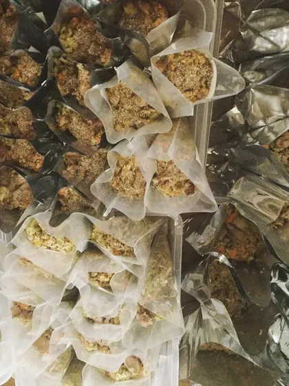 After a long day of cooking, all the meals are sealed and ready for tomorrow. It's a lot of work, but knowing so many dogs will eat well makes it all worth it.