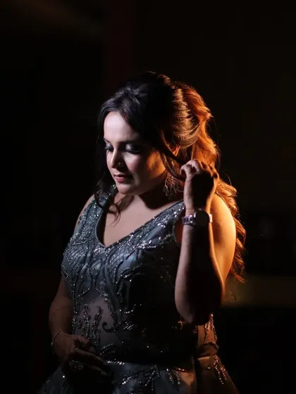 A duplicate of the previous intimate bridal portrait, emphasizing its artistic quality and the beauty of the low-light setting.