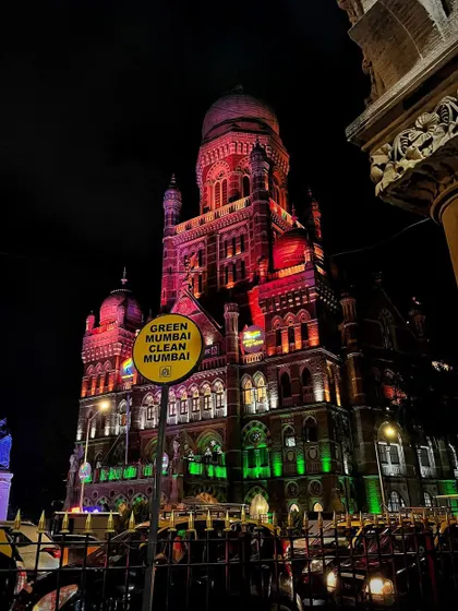 The magnificent BMC building illuminated in the Indian tricolor at night, a stunning example of heritage architecture lighting.
