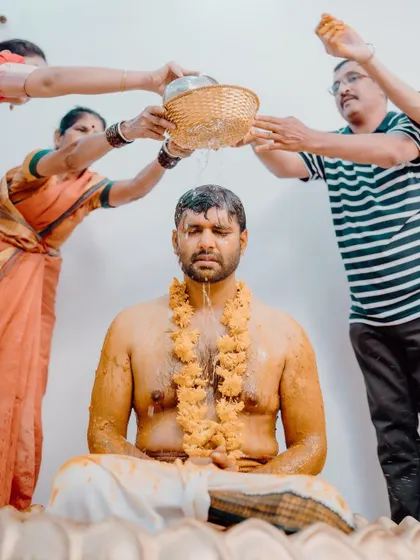 The groom participating in the Haldi rituals. I design the space to be comfortable and functional, ensuring every part of the ceremony goes smoothly.