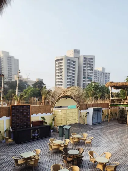 The view from the upper deck of Havanah, looking out over the urban landscape of Faridabad, with our green touches softening the environment.