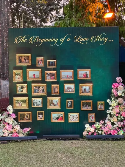 A wider view of the "Love Story" memory wall, showing its placement within the event space.
