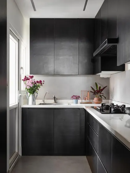 Peeking from one space into another in the 'Rustic Minimal' apartment. We design layouts that create interesting sightlines and a sense of discovery as you move through the home.