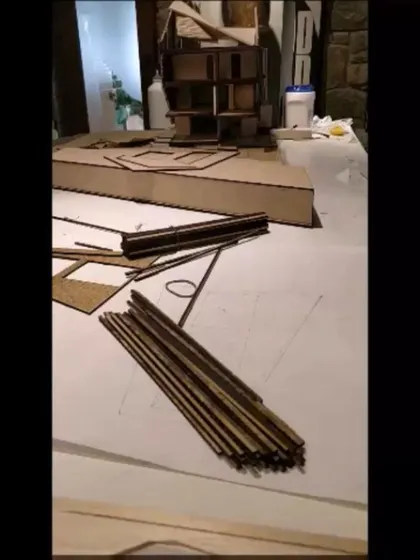 The process of assembling a detailed architectural model in our studio, a crucial step in our design exploration.