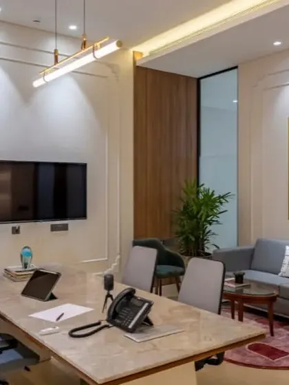 This cabin is designed for both individual work and small team meetings. The main desk is large enough for collaboration, and a separate sofa area provides a more relaxed setting for discussions.