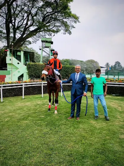 Sofiya, with jockey Shreyas Singh S, after winning the memorial cup.