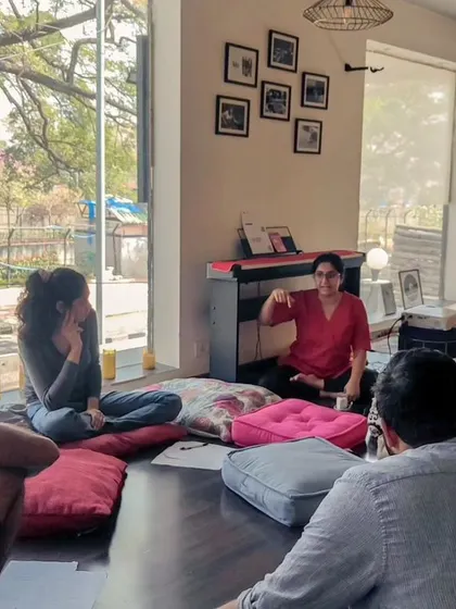 A "Catalyst Session" in progress, where musicians gather to discuss and explore different genres. This workshop focused on fusing Carnatic music with Western jazz and blues.