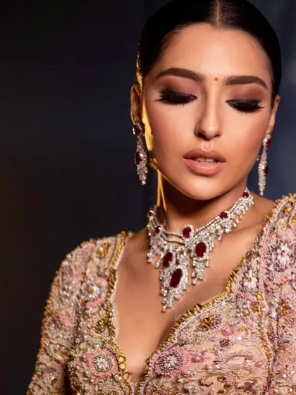 A close-up of the regal reception look. Master the art of creating a flawless, long-lasting base and a dramatic eye.