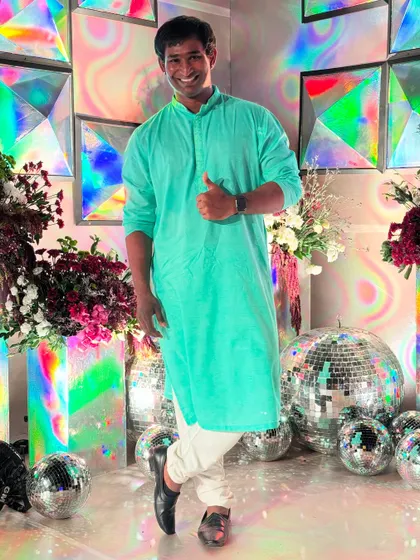 Another shot from the disco-themed sangeet. A thumbs-up to a great night of dance and celebration.